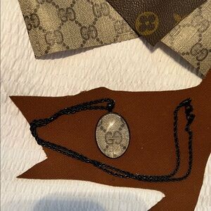 *Upcycled* jewelry/bag charms. Made from authentic materials 👇read below👇